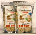Whole grain smoothie packs labeled GrainBooster, featuring natural ingredients like chia, quinoa, and granola.