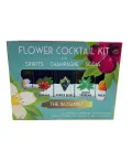 Flower syrup bottle labeled as "Flower Cocktail Kit" by Caufield, featuring floral-infused heat in a glass container.