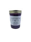 Bear jam in a mason jar labeled Loudounberry Farm, featuring a rustic design and gold lid.