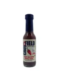 Red pepper chipotle sauce from Caufield in a glass bottle with bold label and spicy flavor blend.