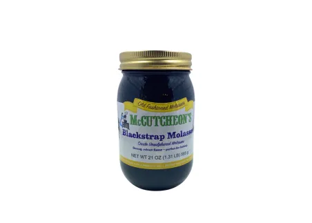 Blackstrap molasses jar from McCutcheon’s with classic label and metal lid for traditional sweetening.