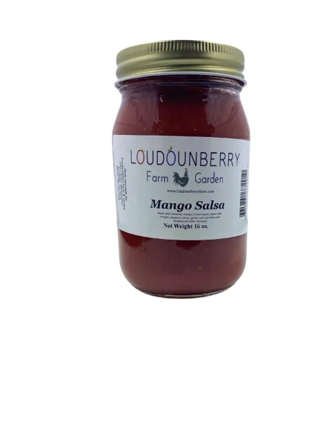 Mango salsa in a glass jar from Loudounberry Farm with bright red color and simple black-and-white label.